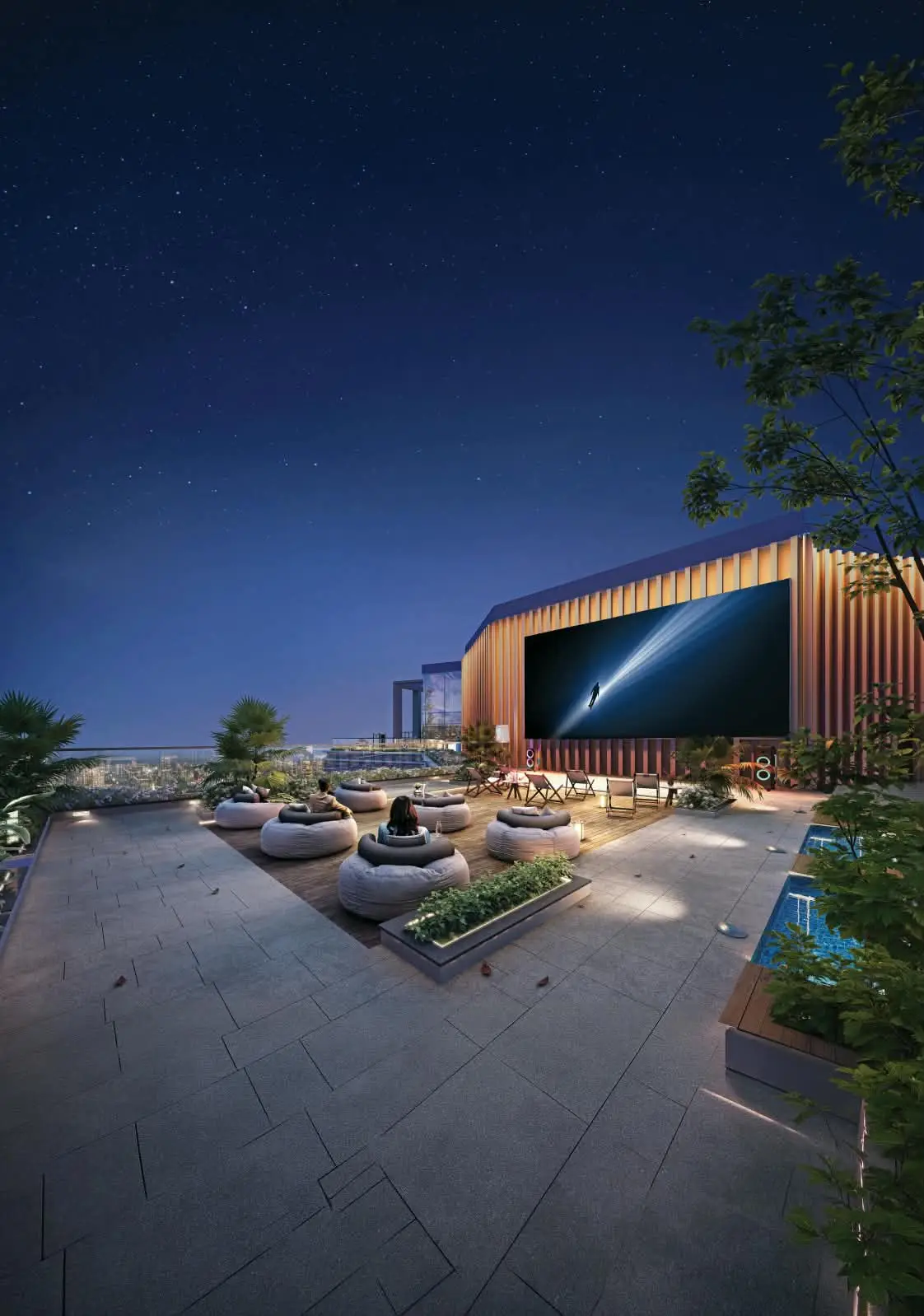 Rooftop open-air screening deck at night